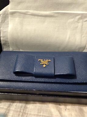 Authentic Prada Navy Saffiano Bow Wallet with Gold Logo
